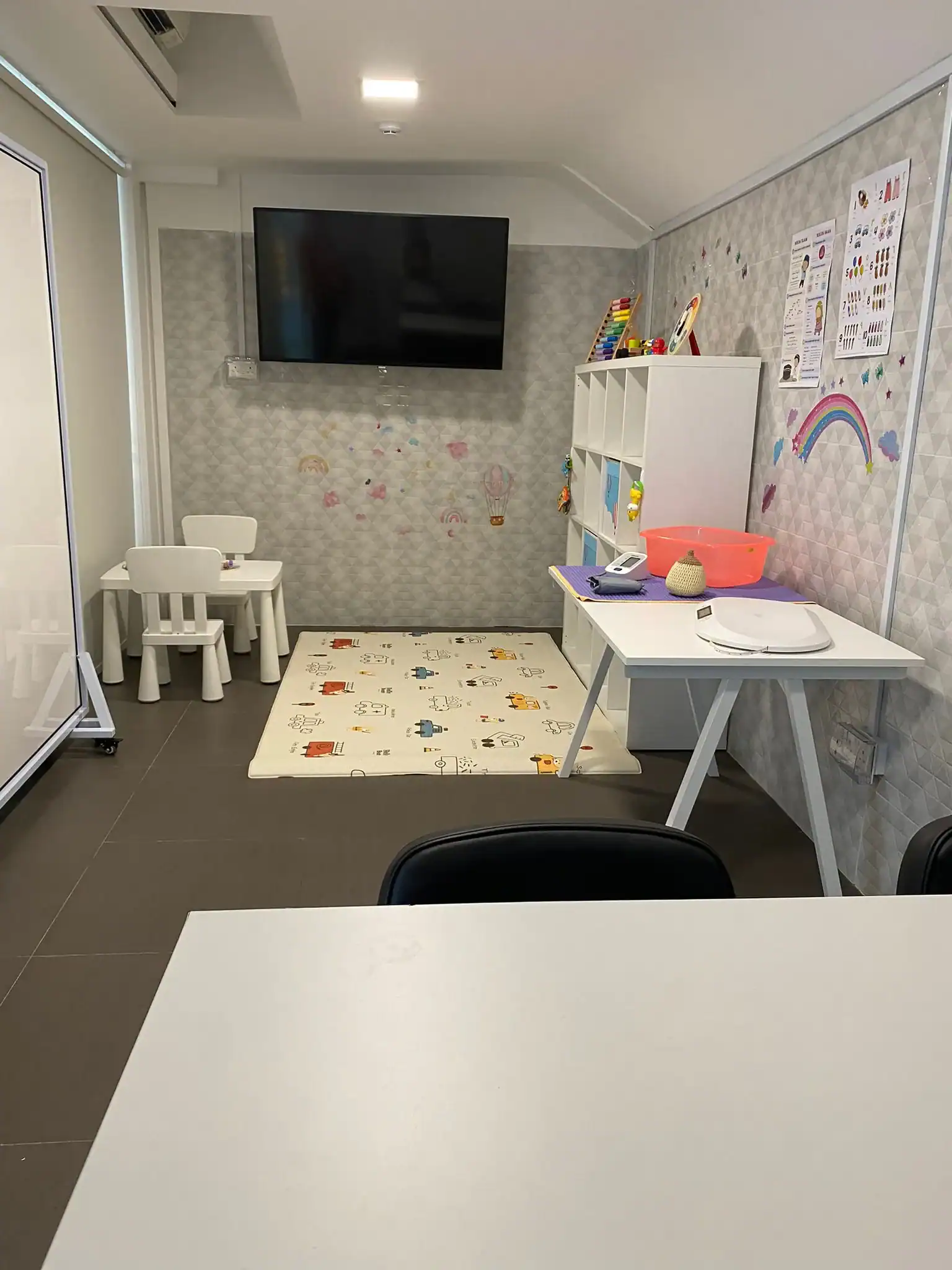 Colourful child-friendly therapy room for children at Project Arif.