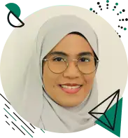 Person smiling wearing glasses and headscarf.